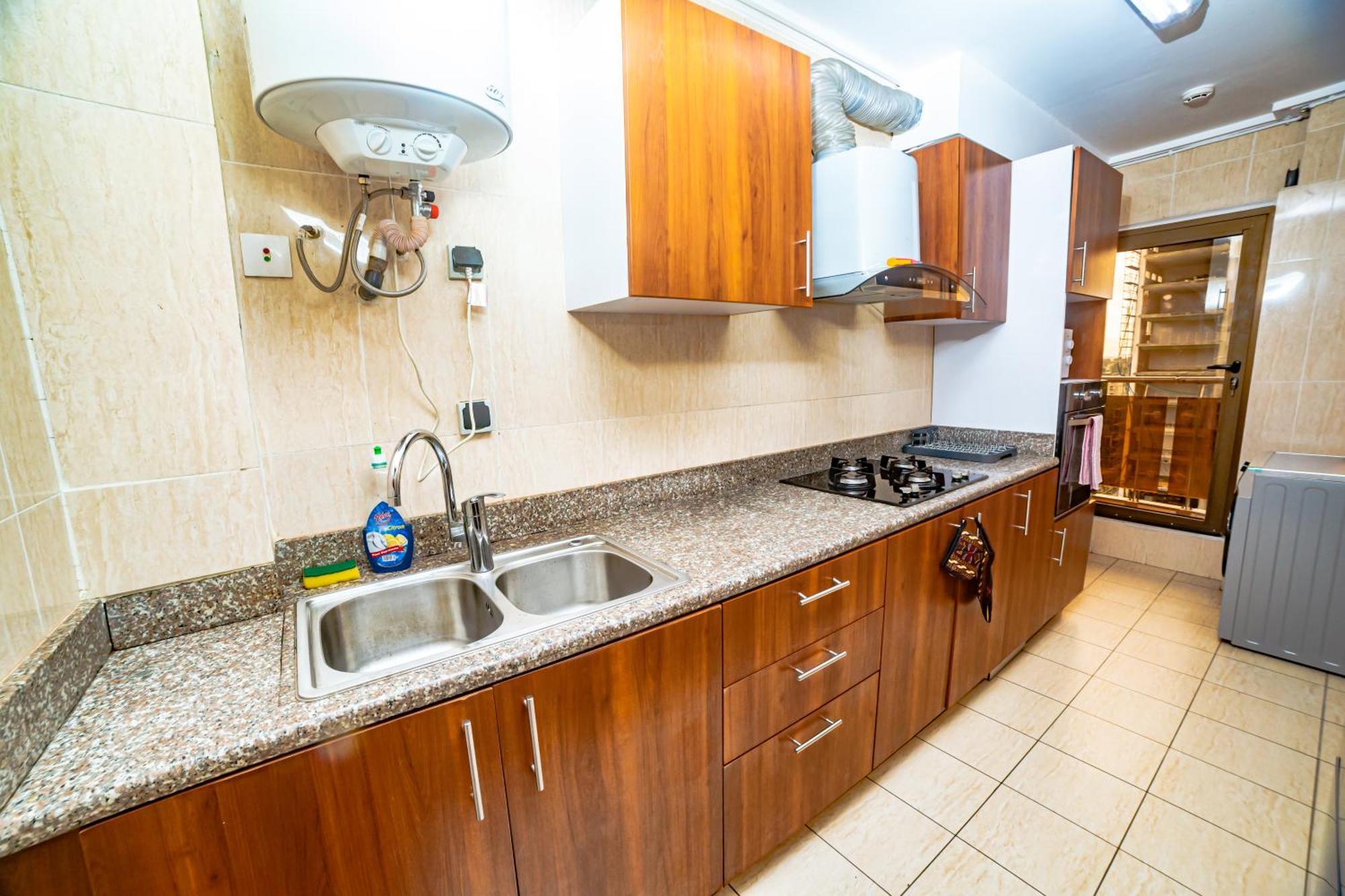 Loumia Premium Bonapriso Apartment Дуала Екстериор снимка